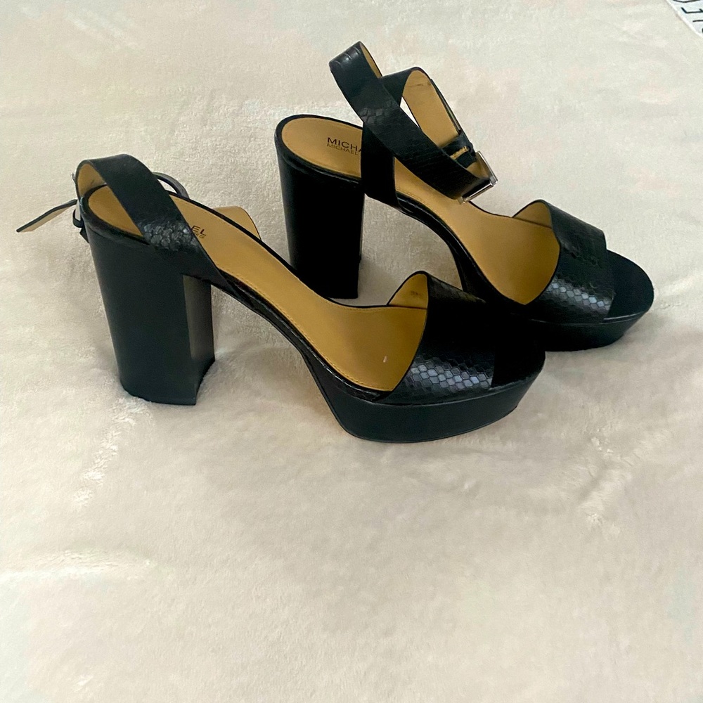 High hill black Michael Kors sandals.